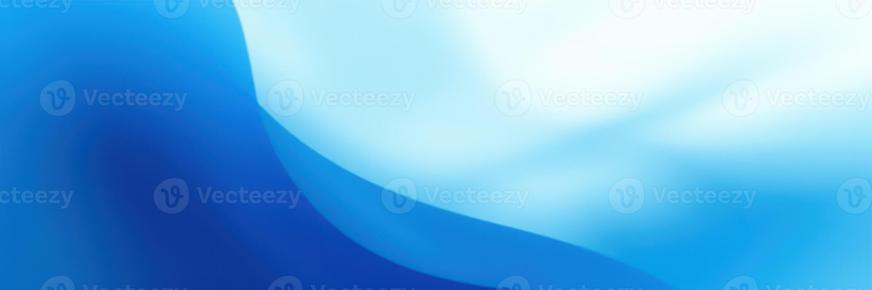 Waves of blue flow gently across the surface, creating a serene and calming atmosphere in a tranquil setting photo