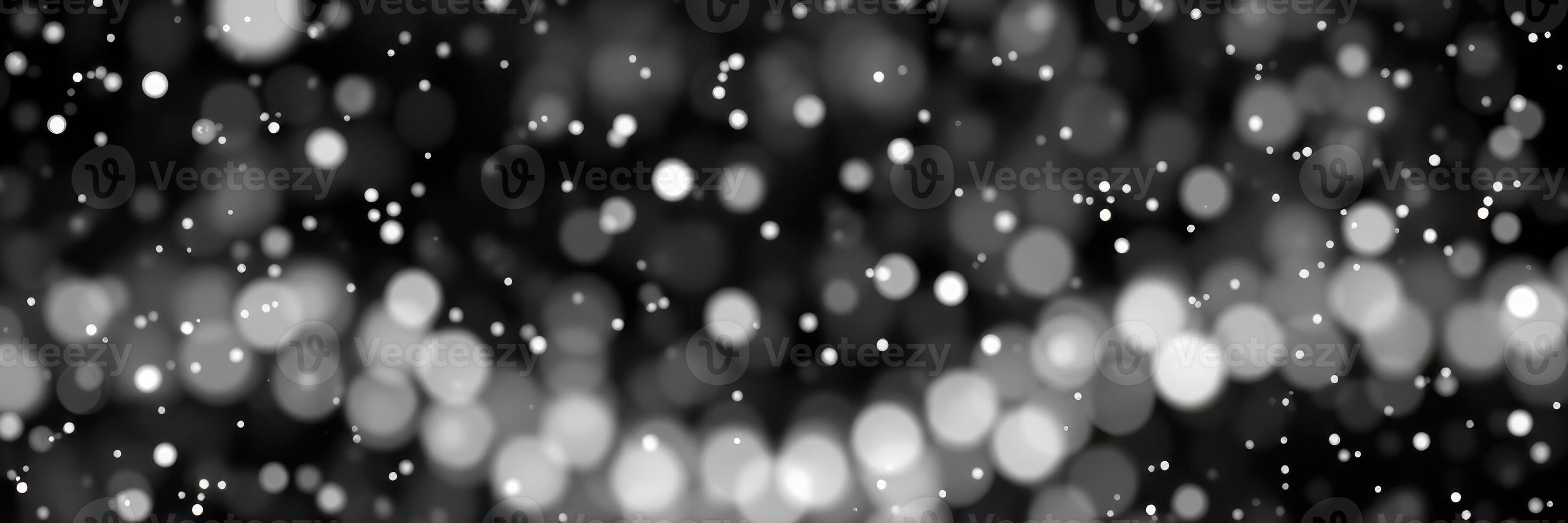 Beautiful bokeh effect with soft white and gray circles creating a magical atmosphere during a winter evening photo