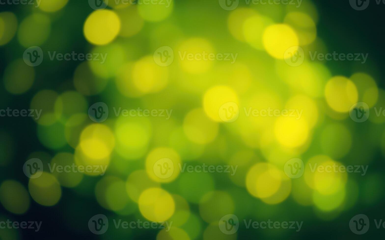 Vibrant yellow-green bokeh lights creating a soft, glowing atmosphere in a dark setting photo