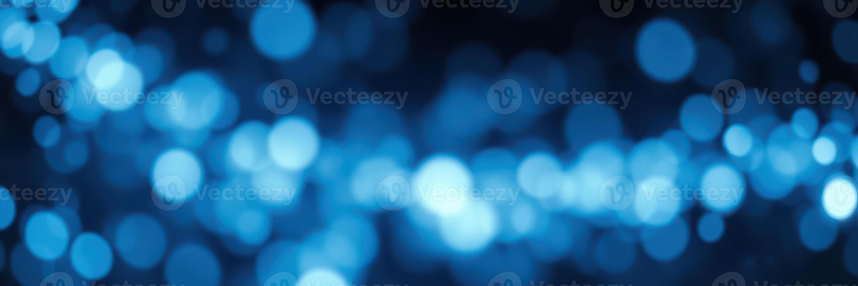 Beautiful blue bokeh lights create a dreamy atmosphere for any creative project or event photo