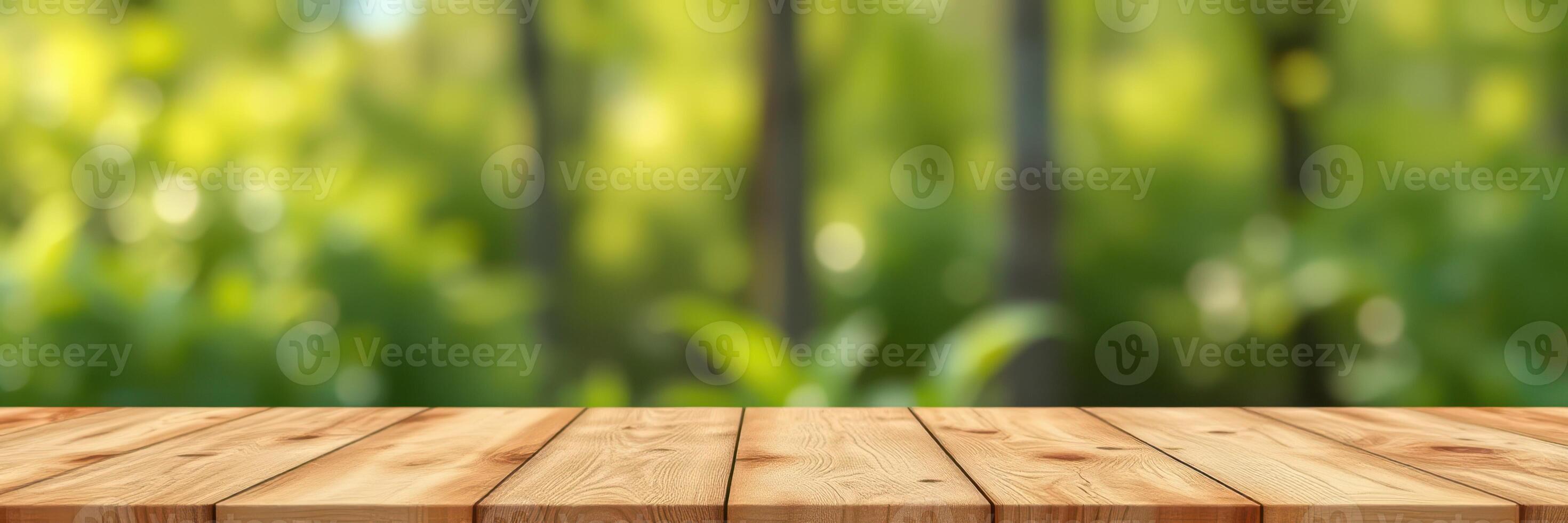 Wooden tabletop with blurred nature background showcasing vibrant greenery in daylight photo