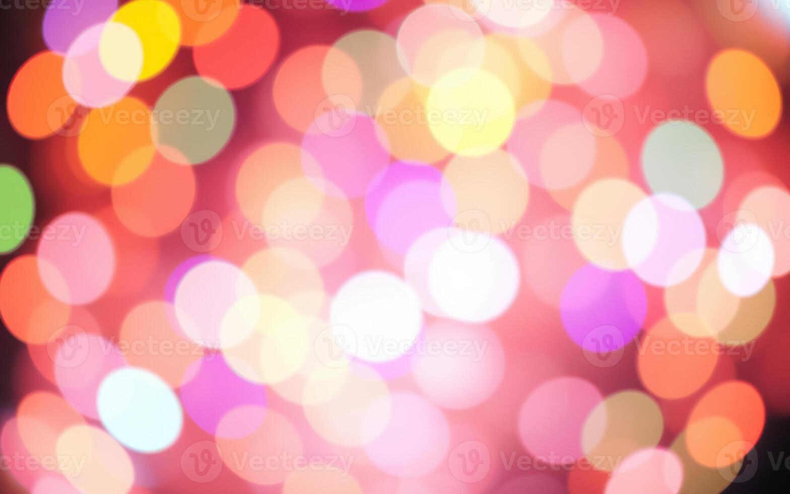 Colorful bokeh lights create a vibrant atmosphere at a festive event during an evening celebration photo