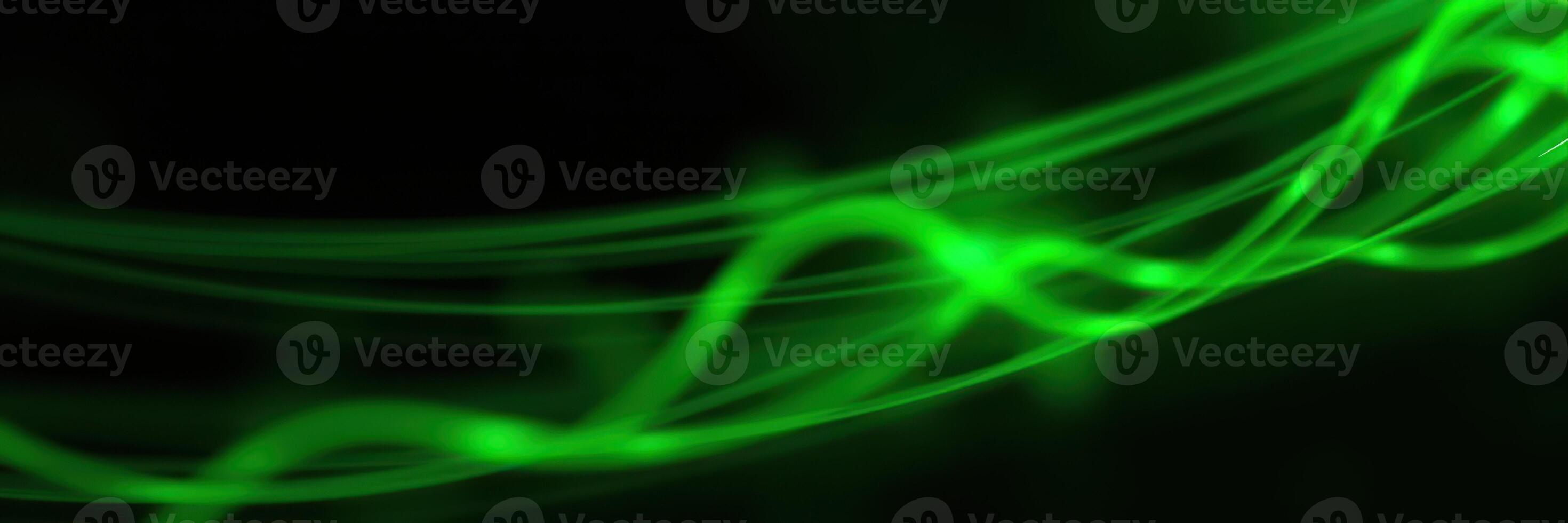 Green wave patterns swirling in the dark background create an intriguing visual experience photo