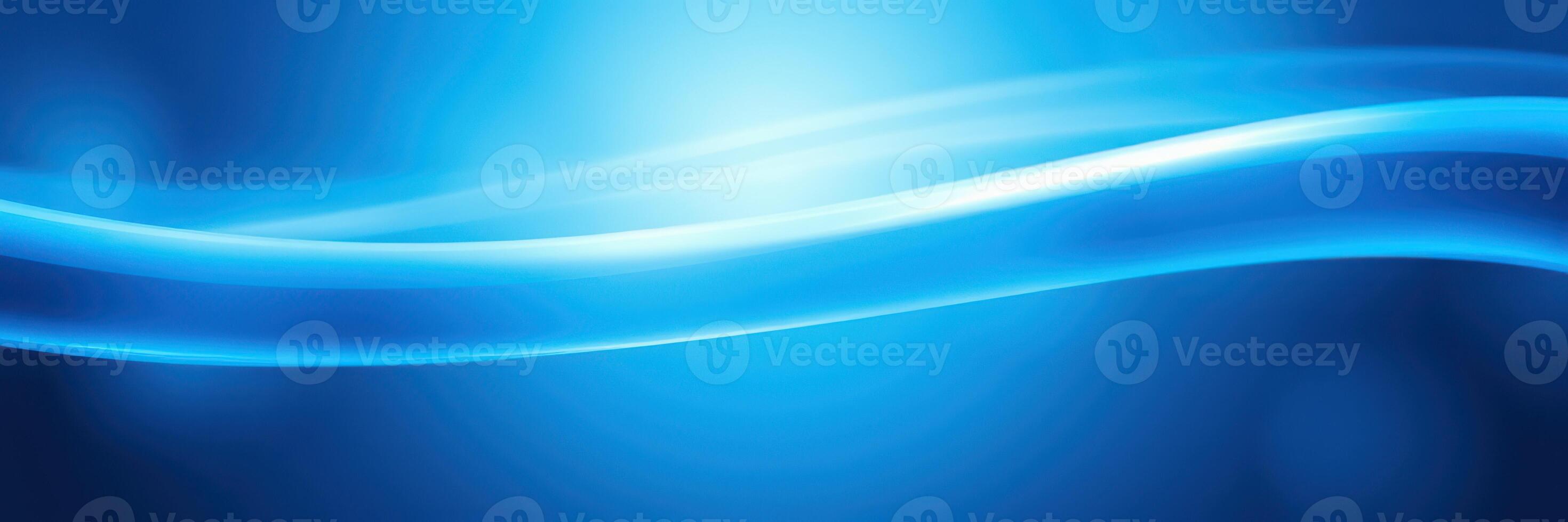 Flowing blue waves creating a soothing abstract background in a tranquil environment photo