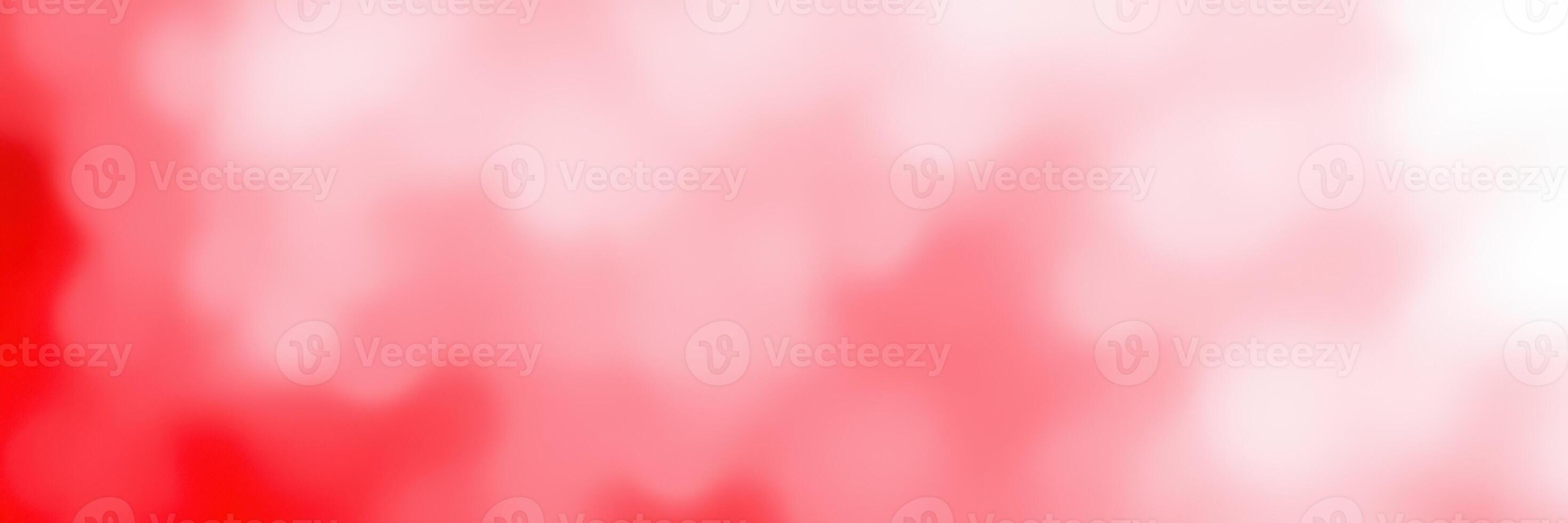 Soft red hues create an atmospheric backdrop during an outdoor gathering in the evening light photo