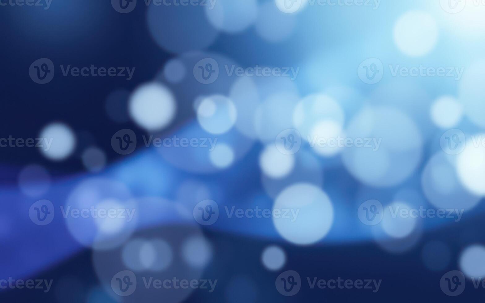 Bubbles and light create a dreamy underwater atmosphere with soft blue tones and glowing reflections photo