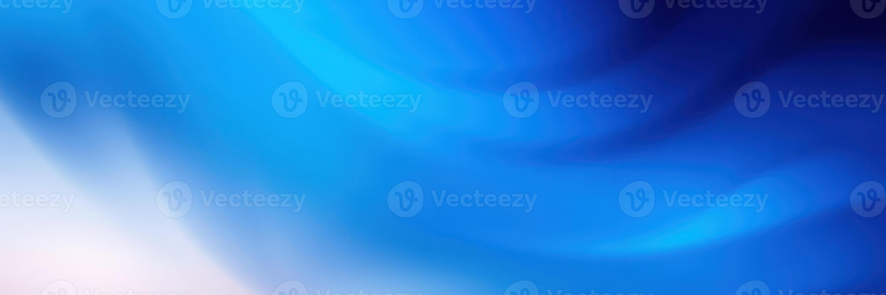 Vibrant blue abstract pattern with soft waves creating an energetic atmosphere for design elements photo