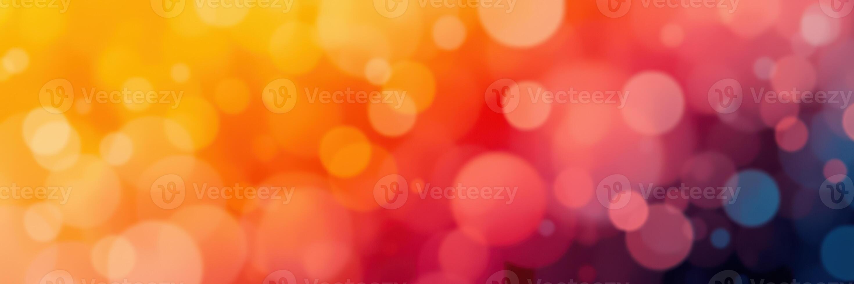 Colorful bokeh background with vibrant shades of orange, pink, and purple creating a dreamy effect photo