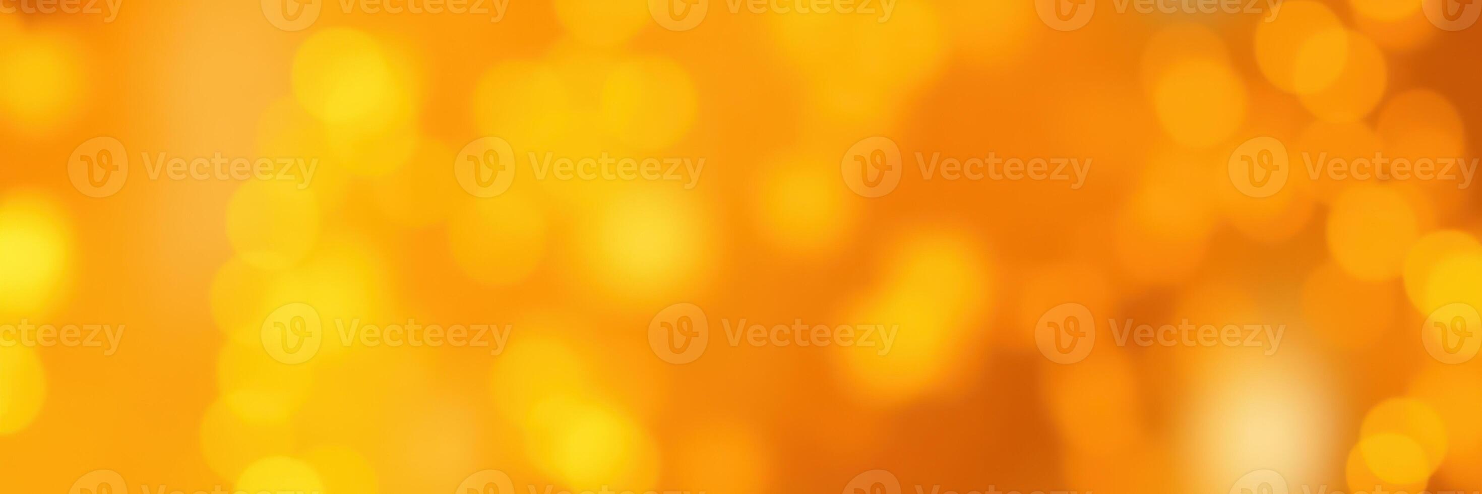 Bright orange bokeh lights create a warm and inviting atmosphere in a festive setting during the evening hours photo