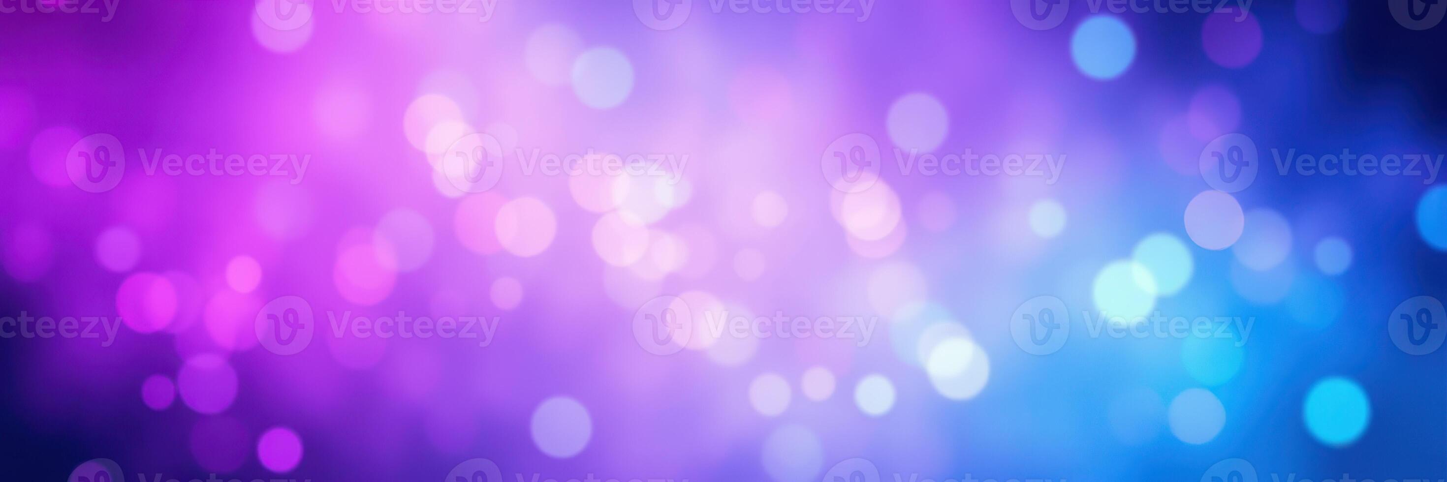 Colorful bokeh background creates a vibrant atmosphere for artistic projects and celebrations using deep purple and blue tones photo