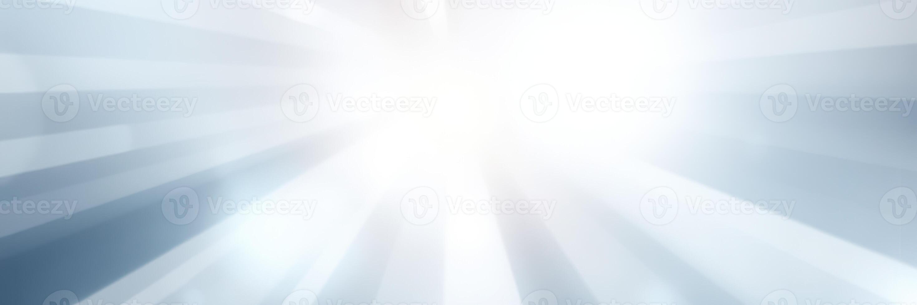 Bright sunlight beams through a clear sky in a serene outdoor setting during midday hours photo
