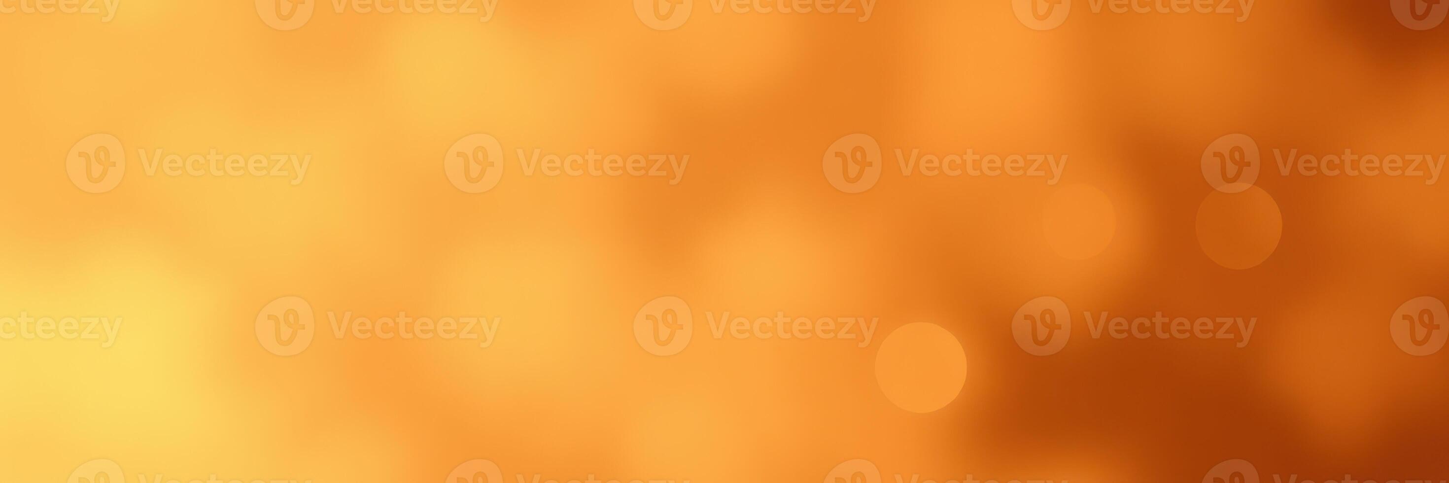 Bright orange abstract background with soft bokeh effects creating a warm and inviting atmosphere for creative designs photo
