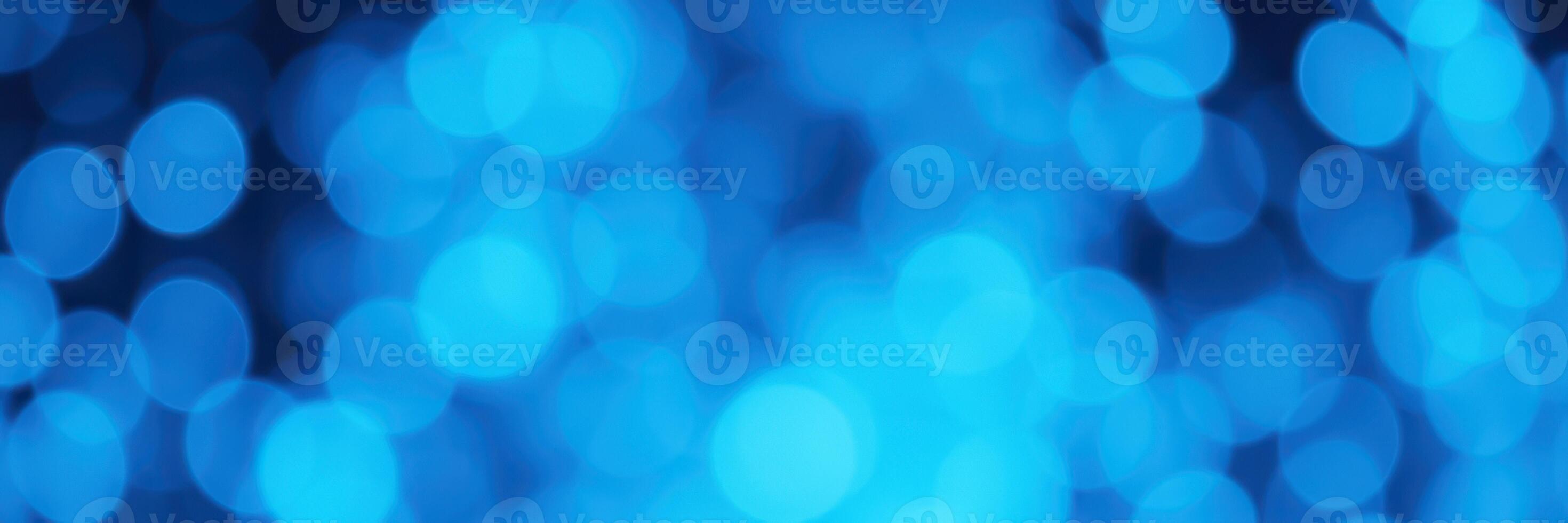 Abstract blue background with glowing lights creating a vibrant atmosphere photo