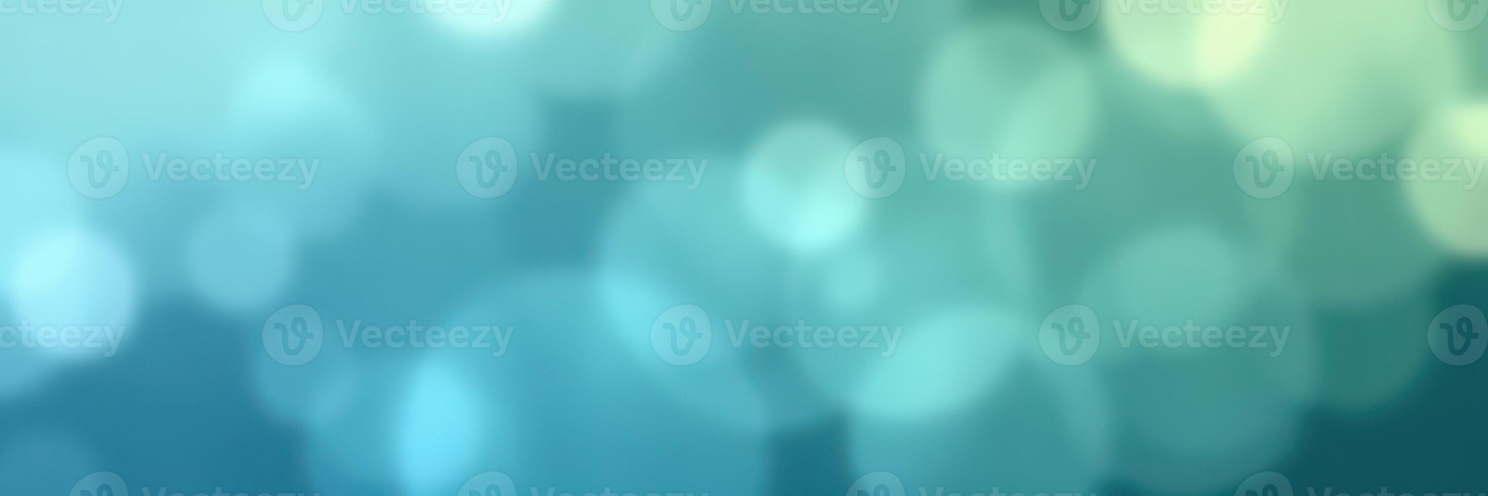 Soft blue bokeh background creating a serene atmosphere with light reflections at twilight photo