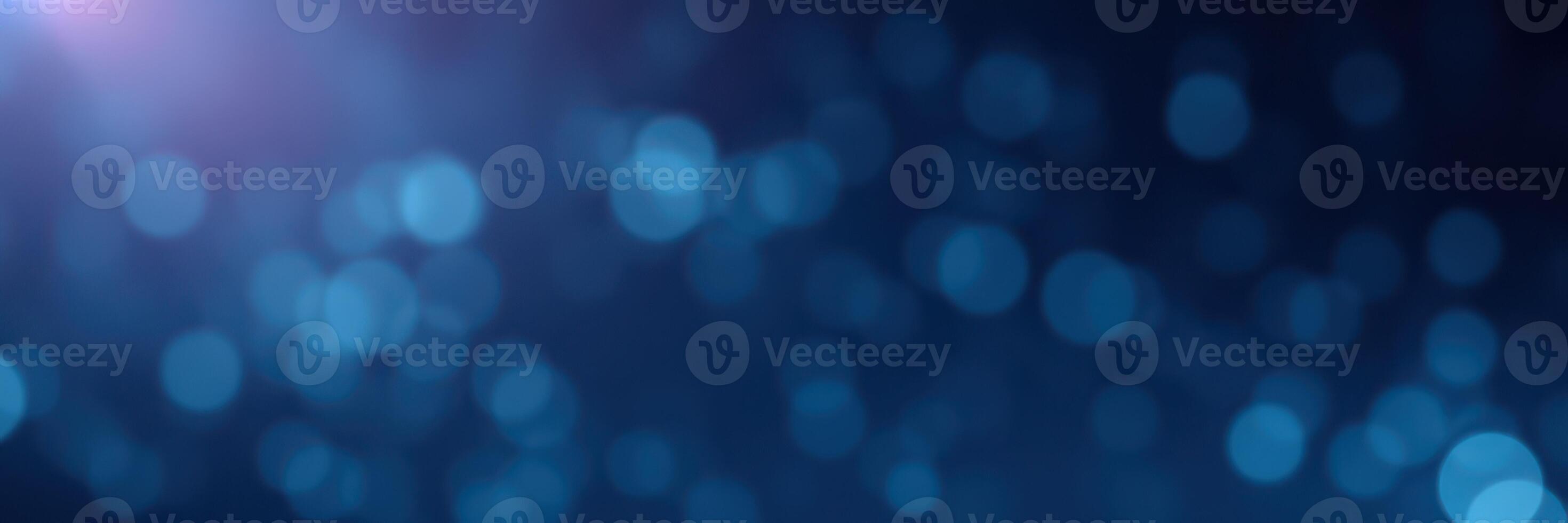 Soft blue bokeh lights create a calming atmosphere in an evening setting photo