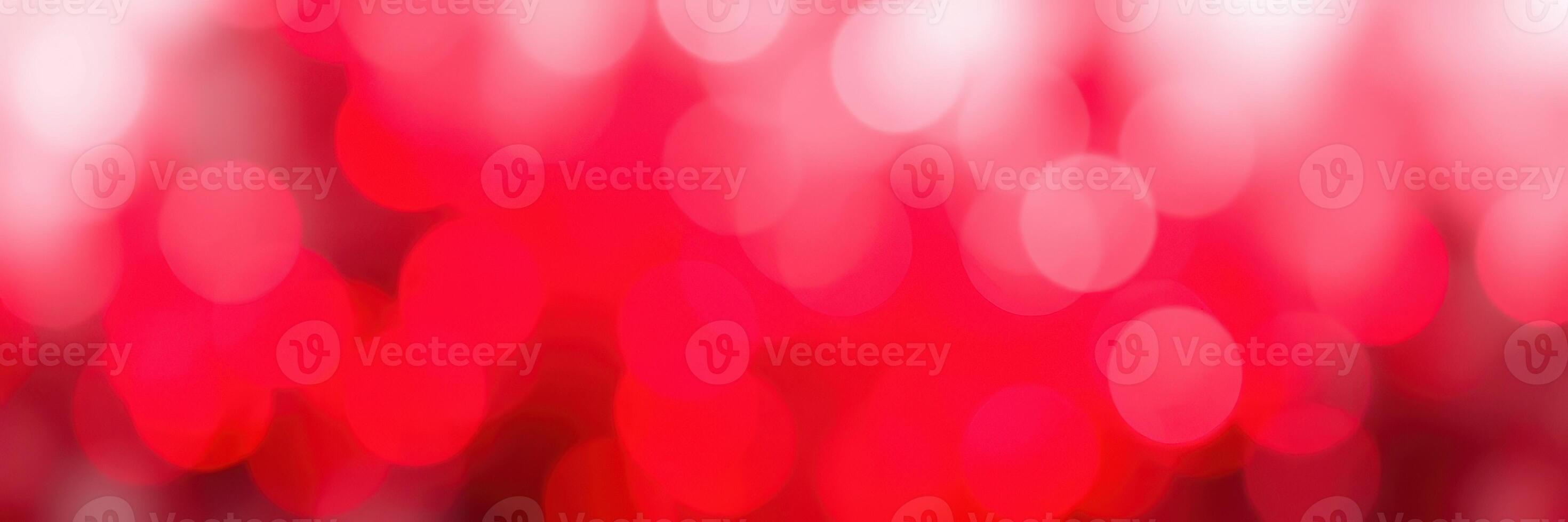 Vibrant red bokeh lights create a festive atmosphere during the evening celebration photo