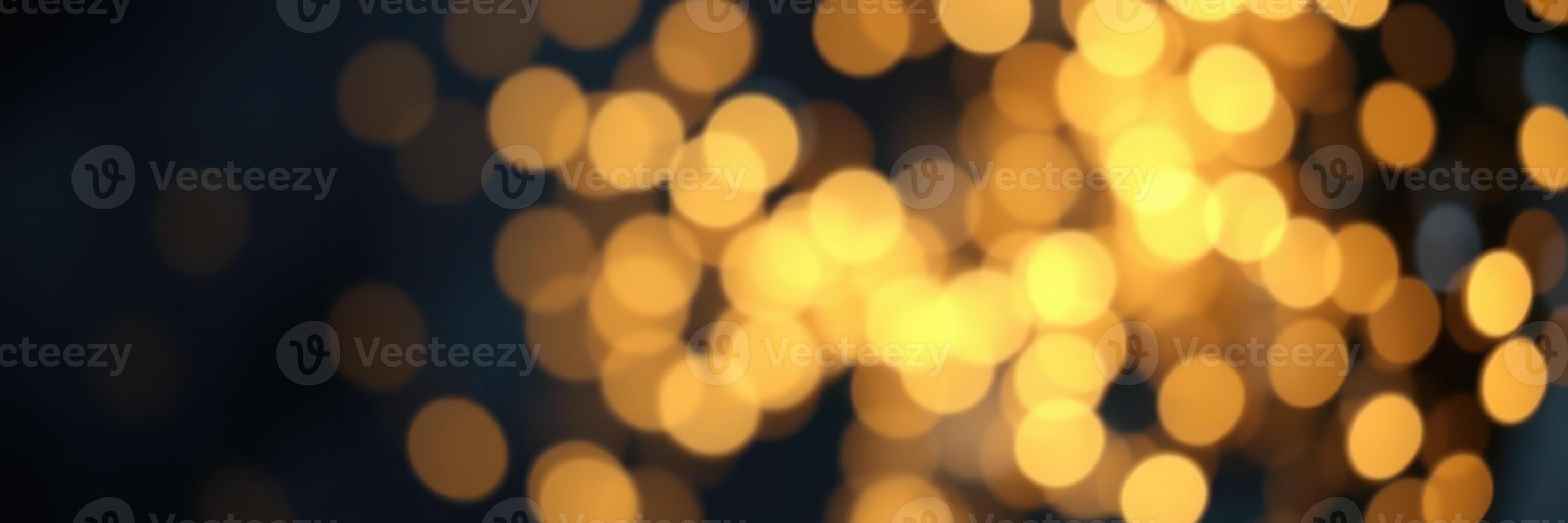 Warm golden bokeh lights create a festive atmosphere during evening celebrations in an urban setting photo