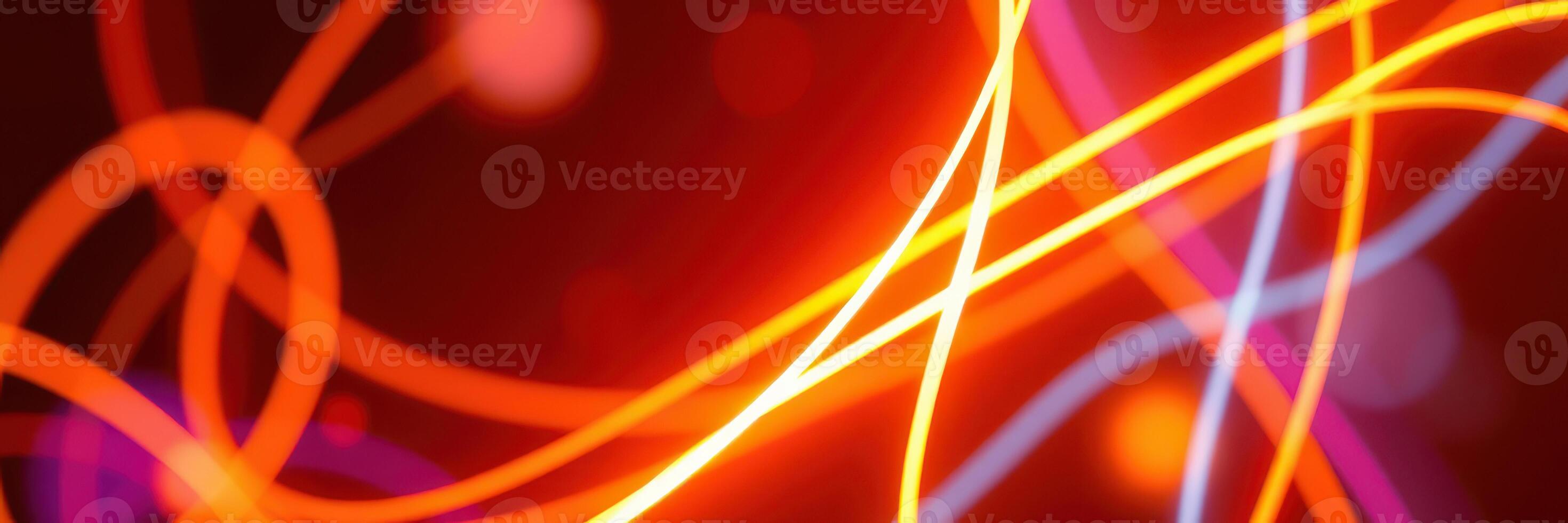 Dynamic colorful light patterns creating an abstract visual display in vibrant hues and flowing lines during a night event photo