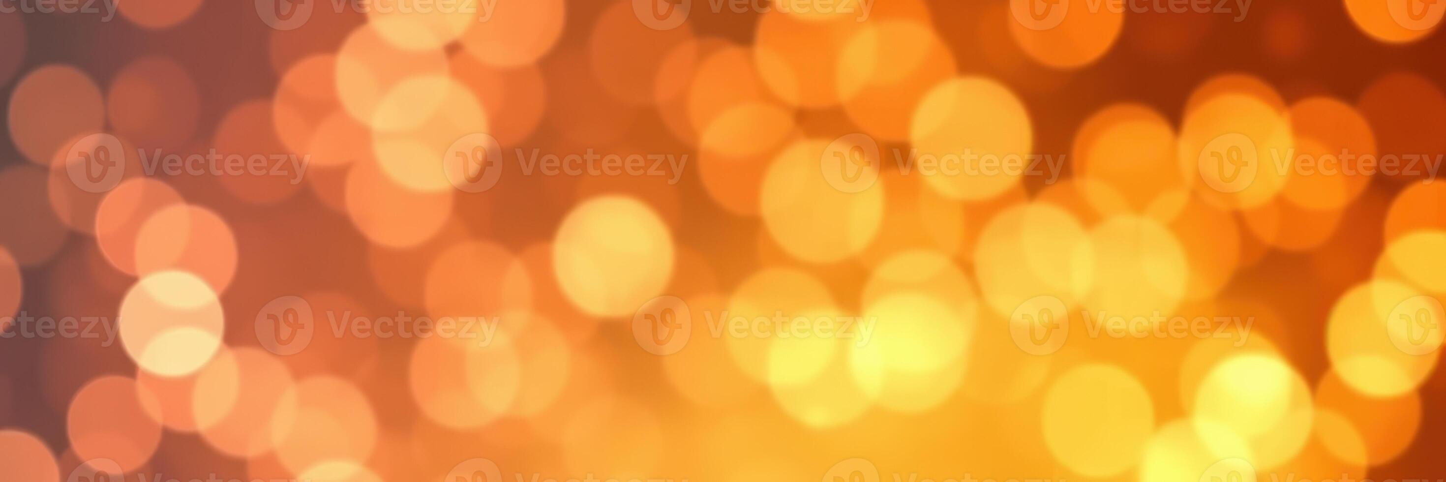 Beautiful bokeh effect with warm orange and yellow tones creating a vibrant atmosphere during evening events photo