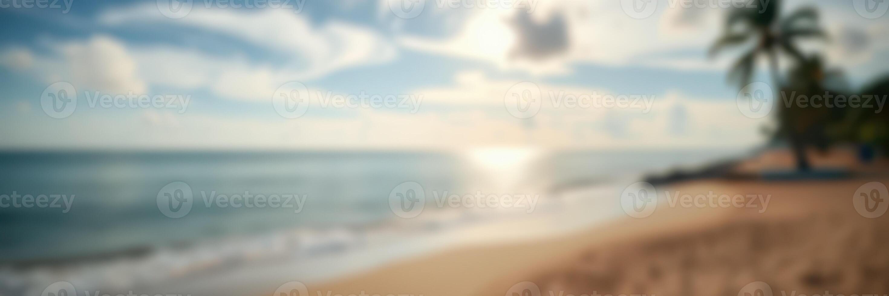 Beautiful tropical beach at sunset with soft waves and palm trees in the distance providing a serene atmosphere photo
