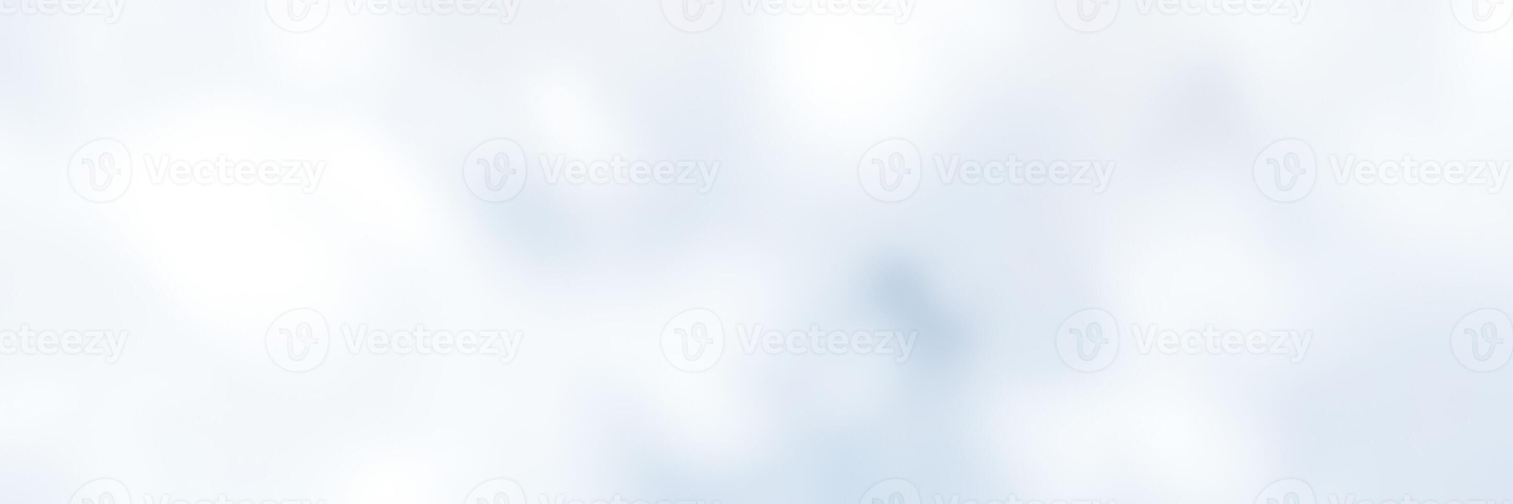 Cloudy sky with soft light filtering through over a tranquil landscape at midday photo