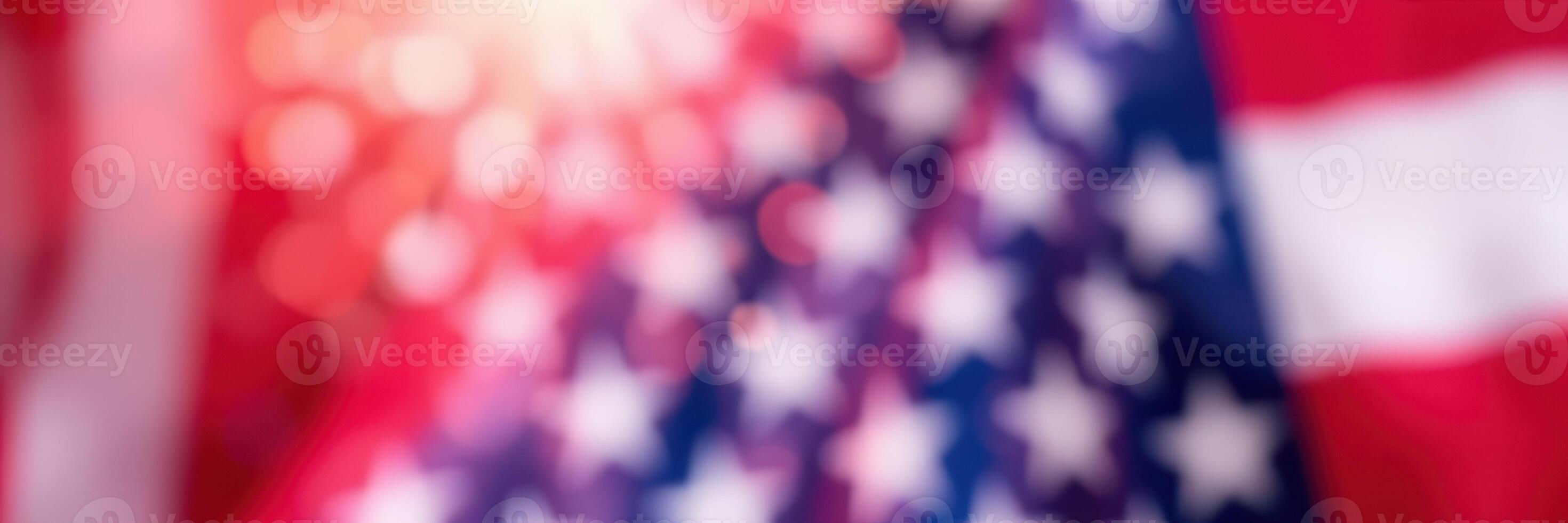 Colorful depiction of the American flag with a soft glow highlighting stars and stripes photo