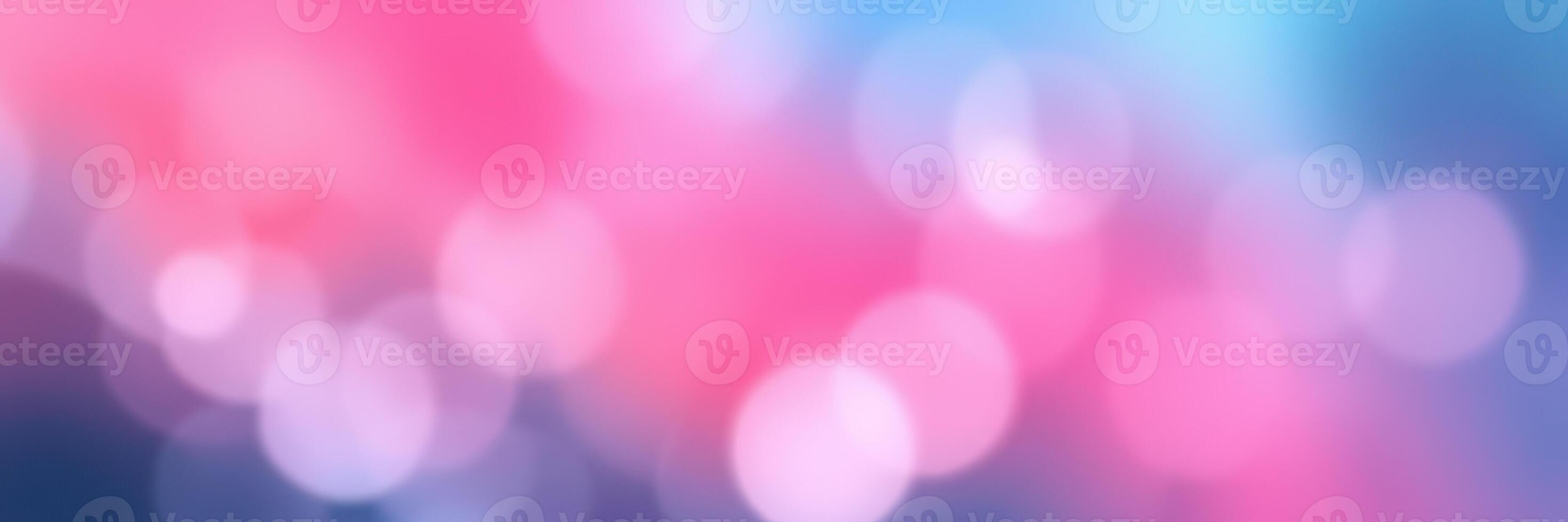 Soft bokeh effects create a dreamy atmosphere with pink and blue colors in a blurred background photo