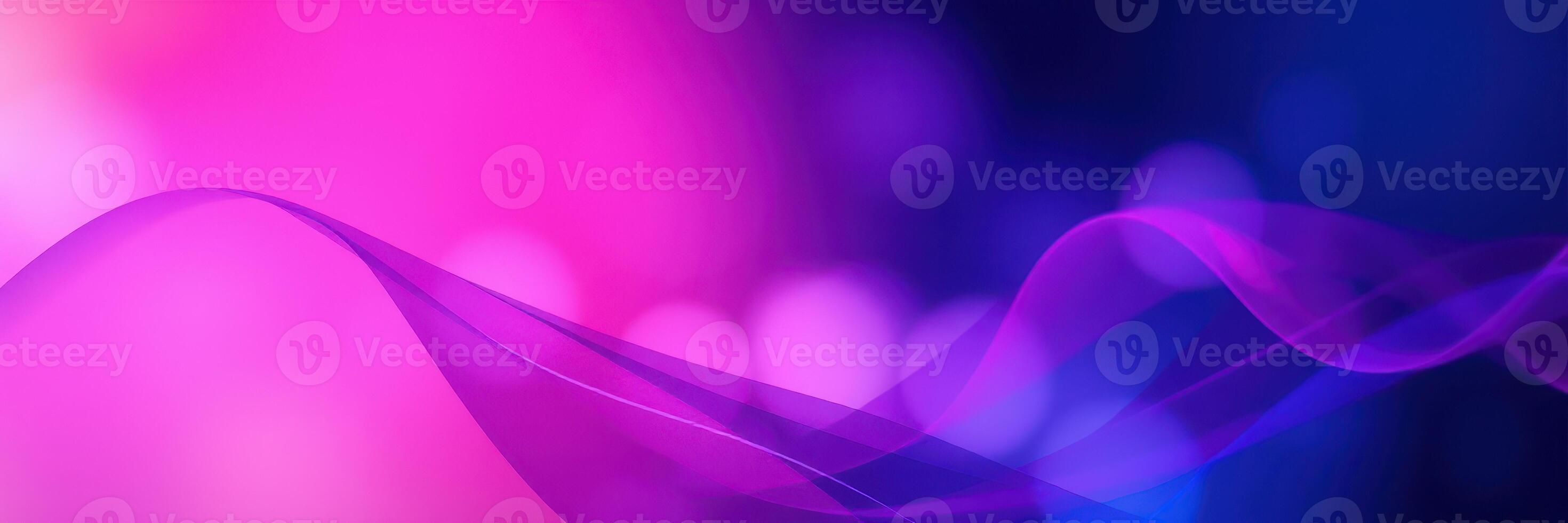 Colorful abstract wave patterns blend in vibrant pink and blue tones, creating a dynamic visual experience photo