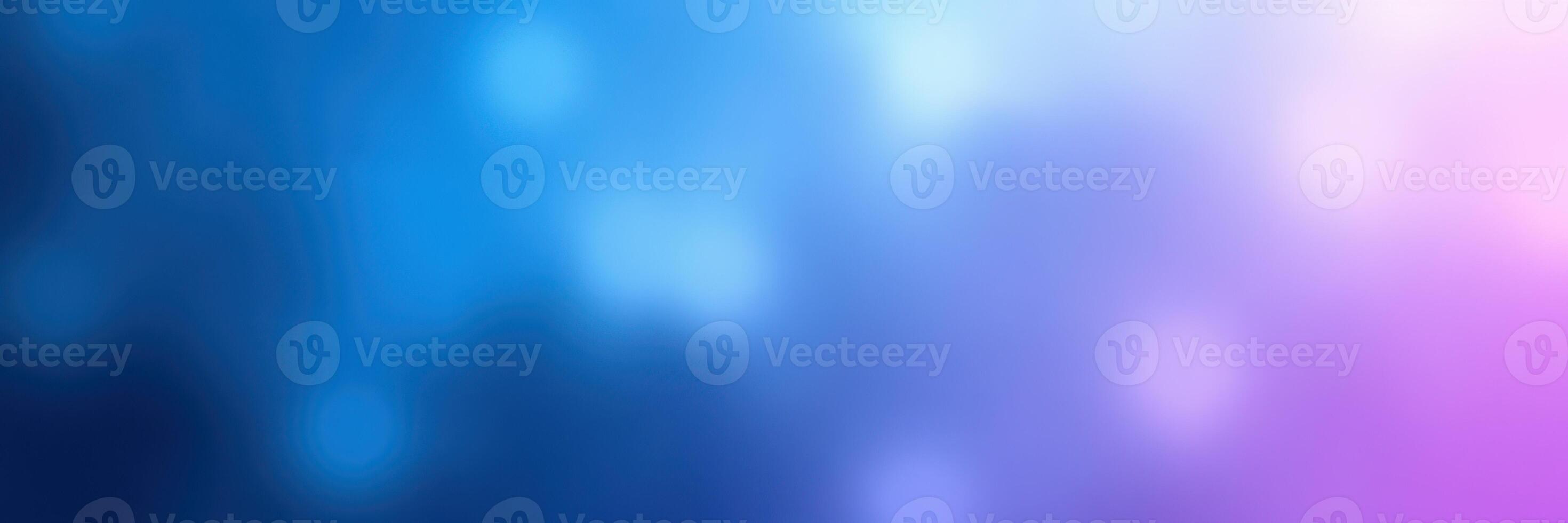 Colorful abstract background blending shades of blue and purple with soft bokeh effect creating a dreamy atmosphere photo