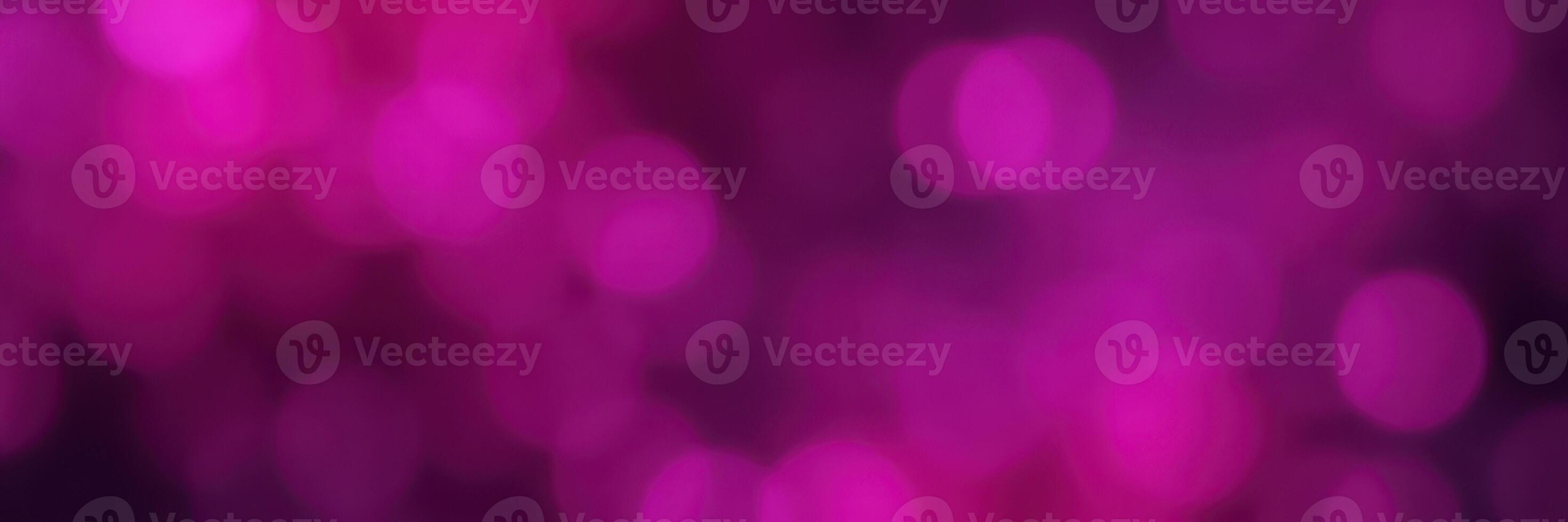 Colorful abstract background with pink and purple bokeh lights enhancing artistic expression photo
