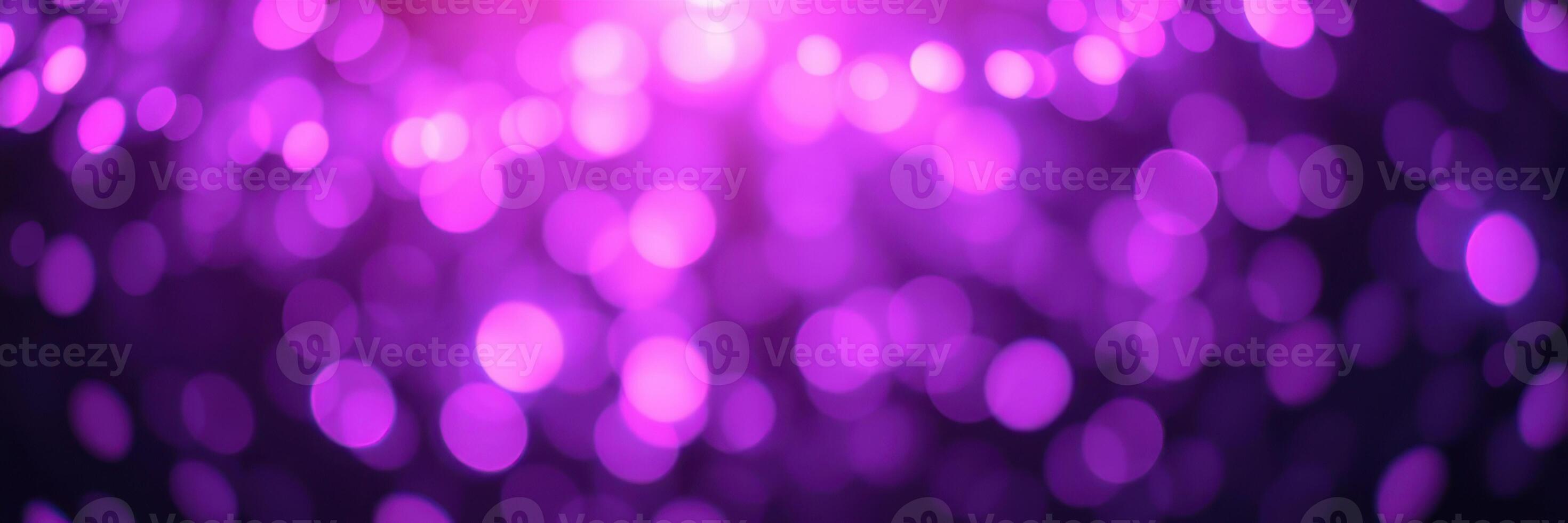 Beautiful purple bokeh lights creating a dreamy atmosphere for a celebration or event in an indoor setting photo