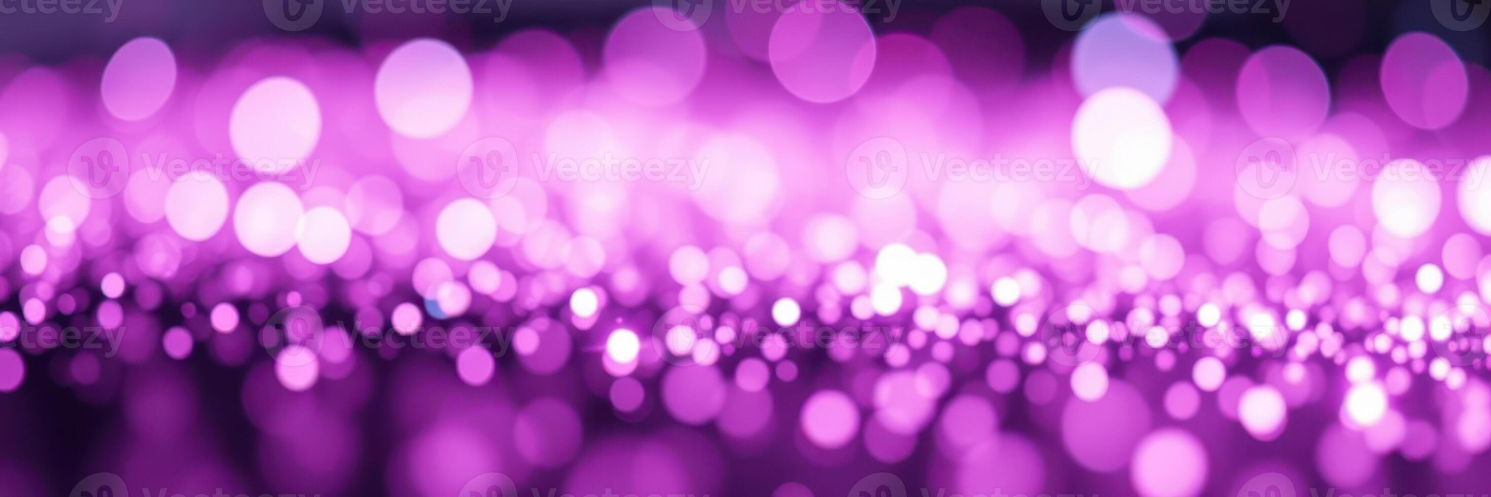 Sparkling purple bokeh lights create a dreamy atmosphere in a festive setting during an evening celebration photo