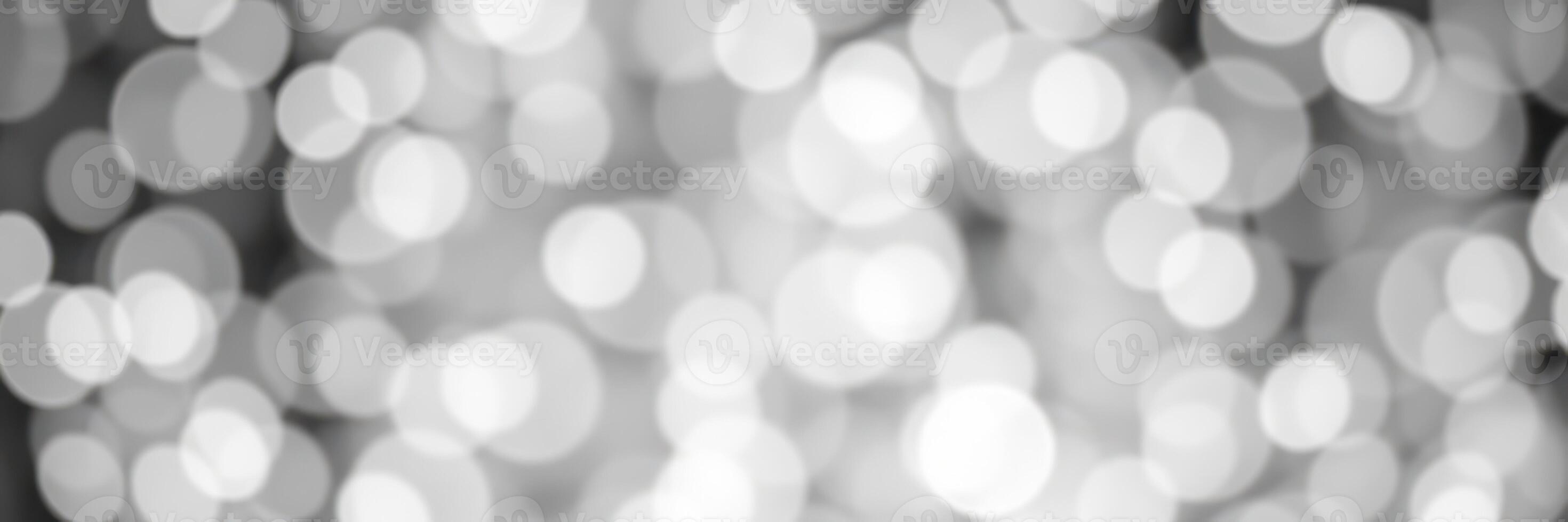 Soft, shimmering bokeh lights create a dreamy atmosphere in a cozy space during evening hours photo