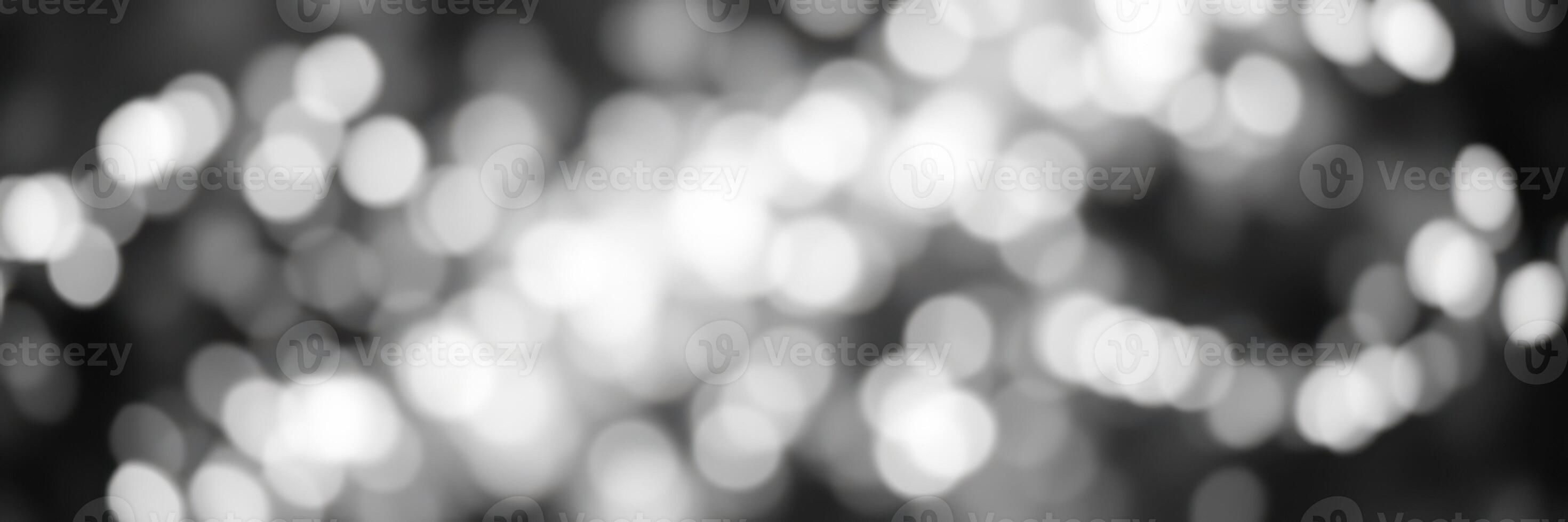 Soft bokeh lights create a dreamy atmosphere in an outdoor setting during twilight photo