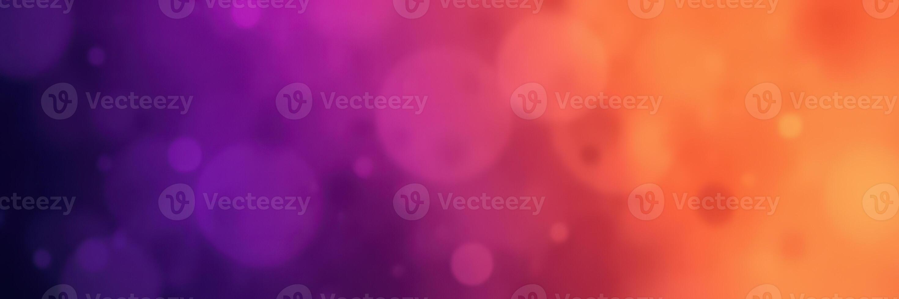 Vibrant colorful bokeh background featuring shades of purple and orange in a soft dreamy atmosphere photo