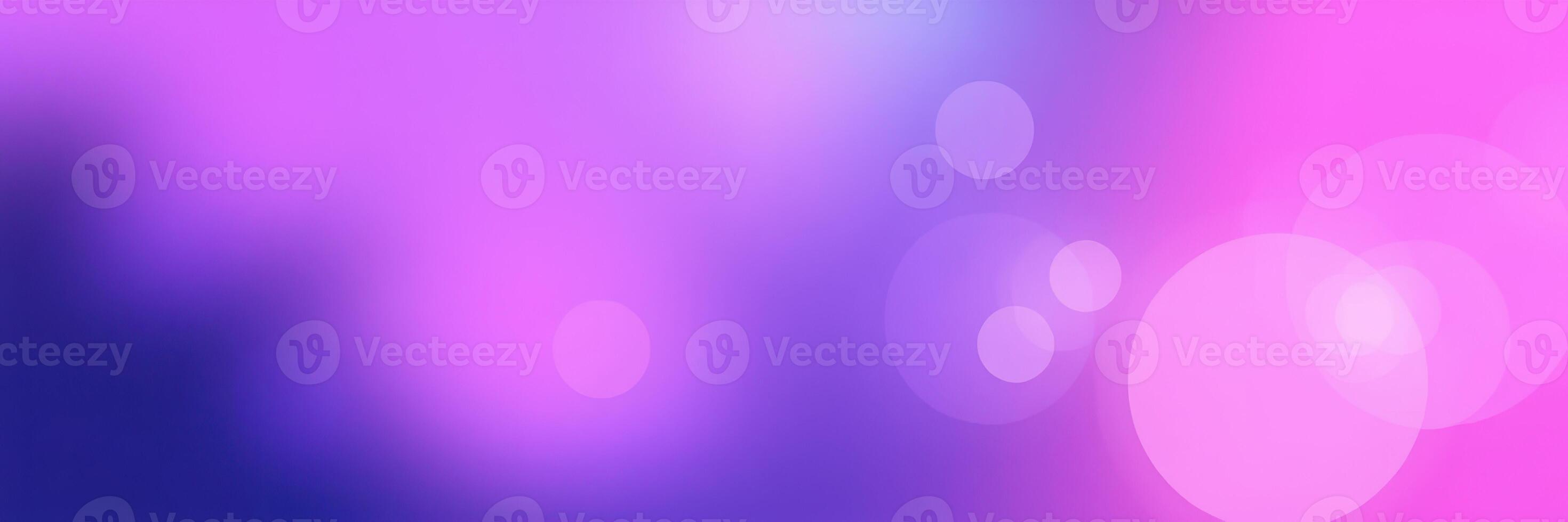 Colorful abstract background with soft bokeh effect illuminated by purple and pink hues creates a dreamy atmosphere photo