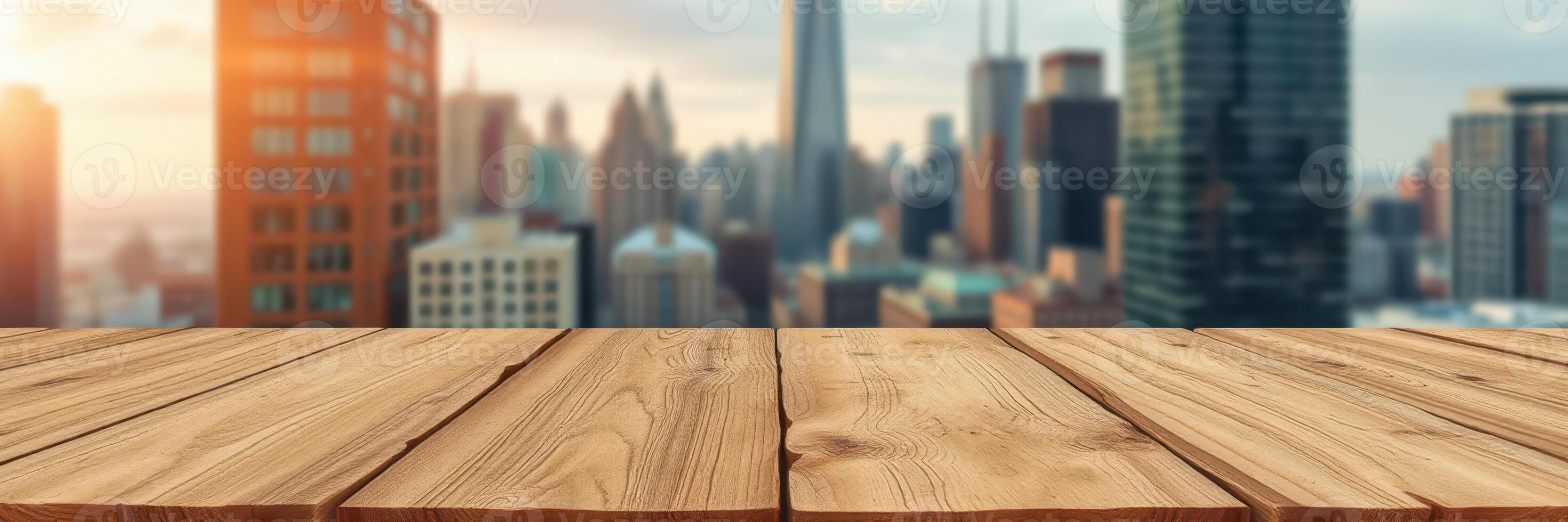 View of a city skyline from a wooden table at sunset surrounded by towering buildings and a vibrant atmosphere photo