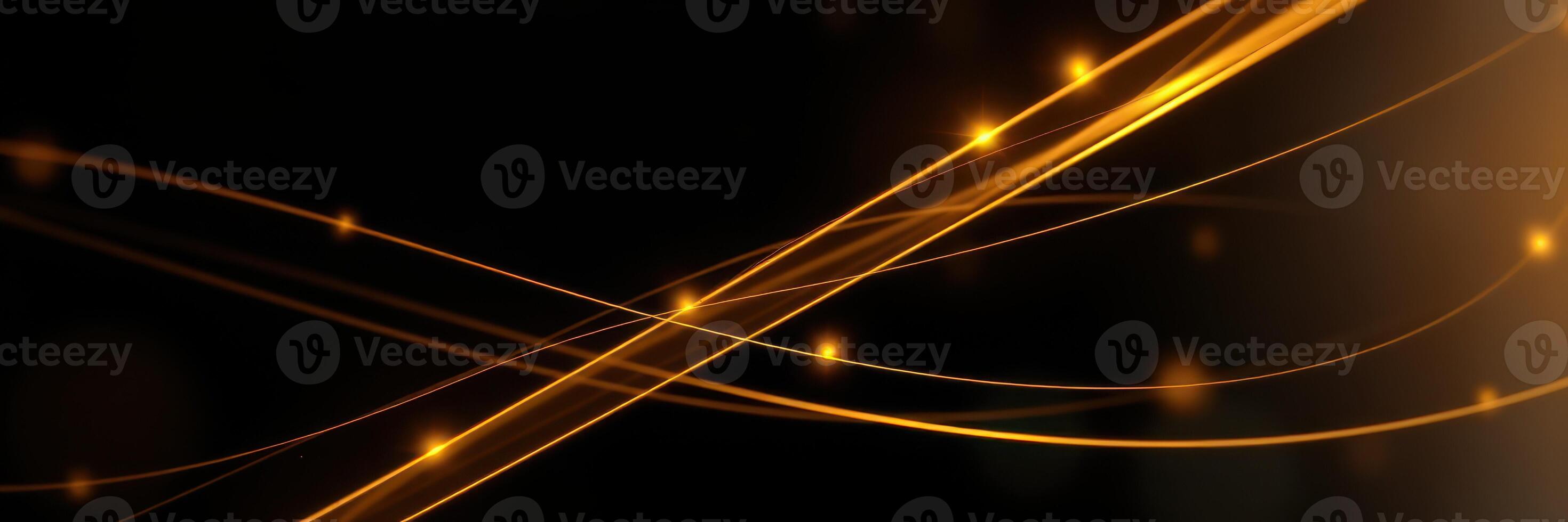 Golden light trails create a mesmerizing effect against a dark background during a nighttime event photo