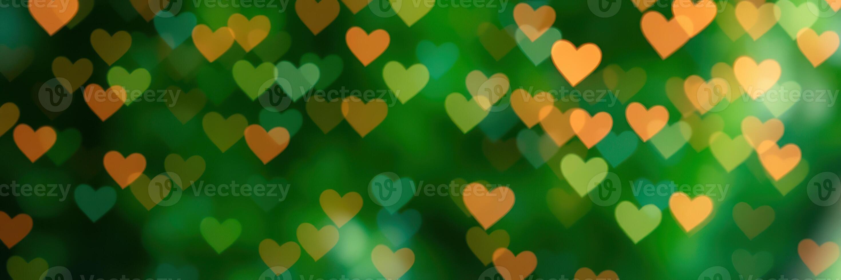 Colorful hearts create a whimsical atmosphere in a vibrant green background photo
