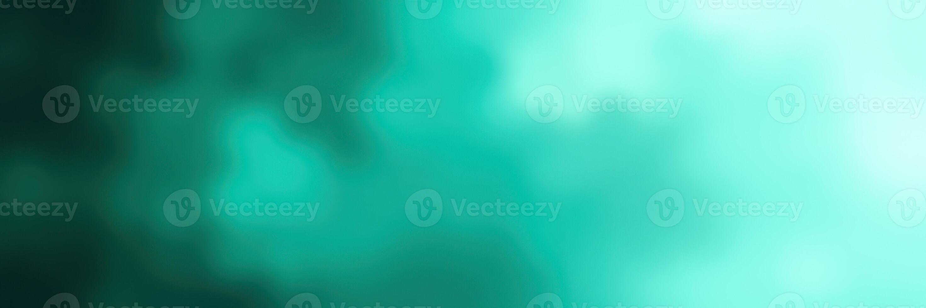 Abstract teal and green background with varying shades and textures reflecting a serene atmosphere photo