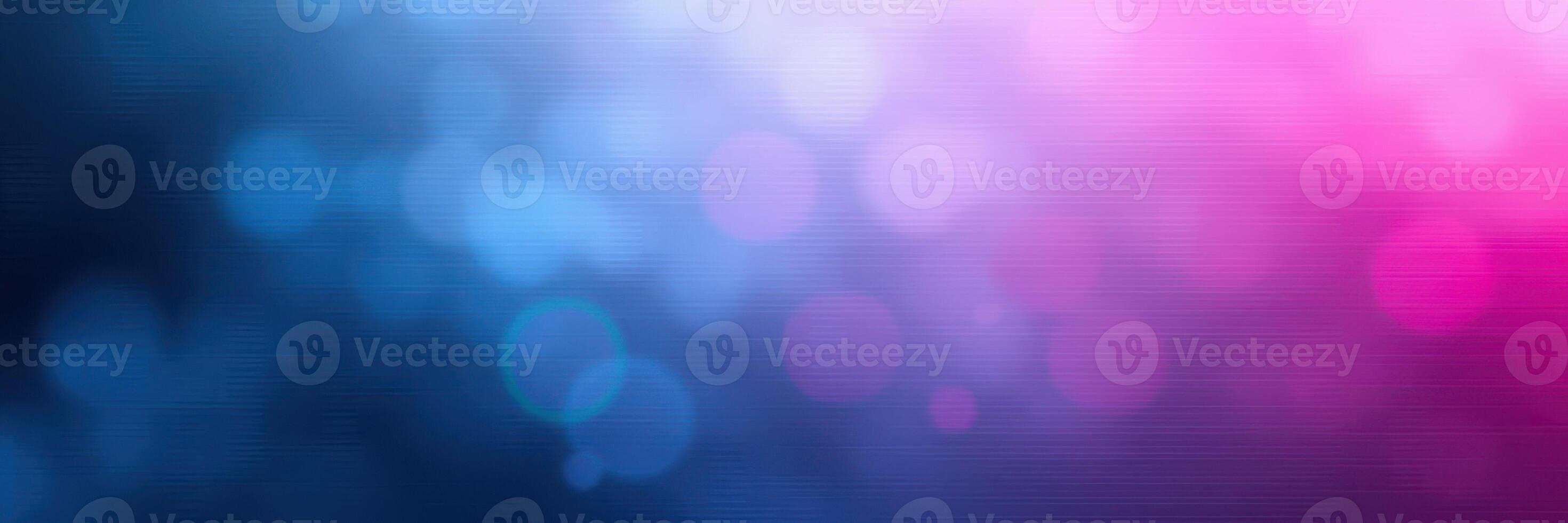 Vibrant abstract background with soft bokeh effects in shades of blue and pink creating a dreamy atmosphere photo