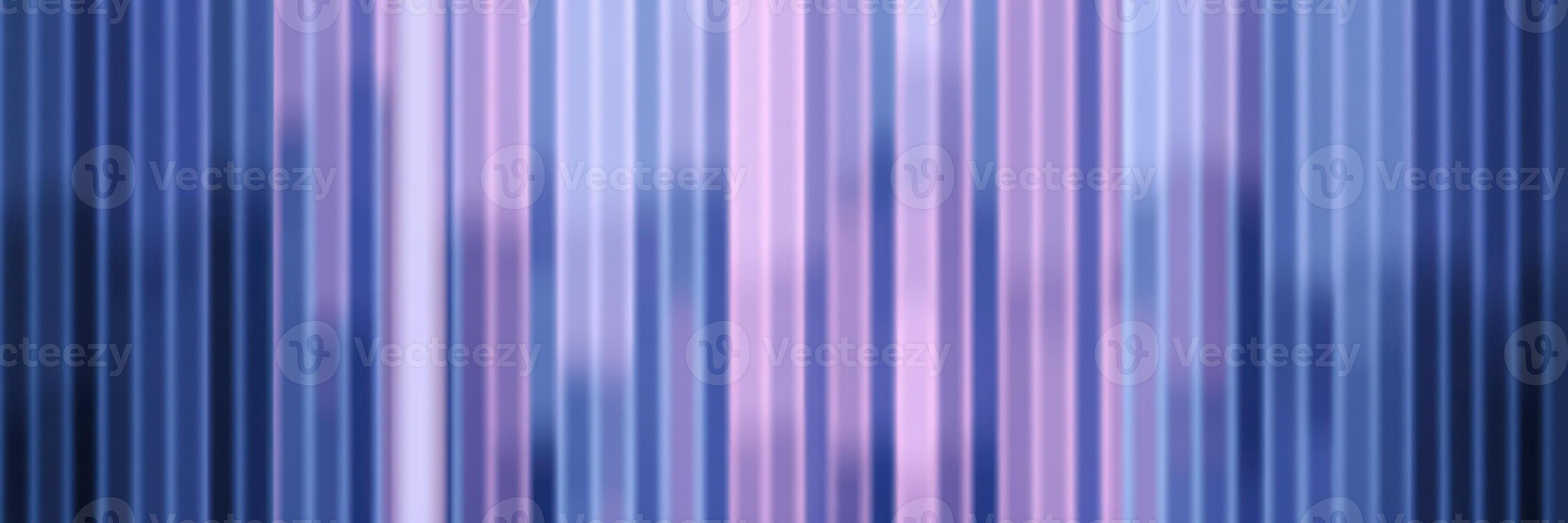Colorful vertical stripes create a vibrant abstract pattern in shades of purple and blue during a quiet evening photo