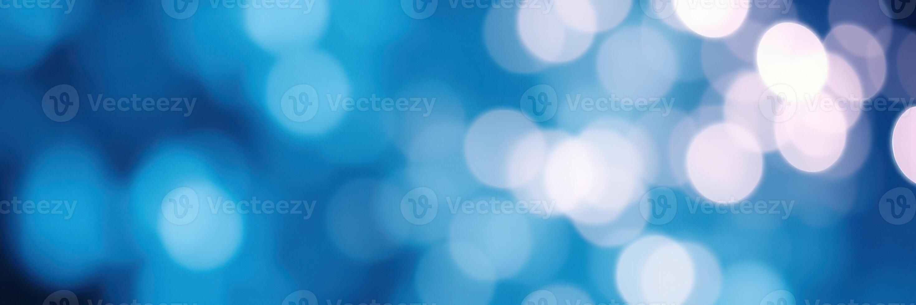Abstract blue bokeh background creates a calming atmosphere for various design applications photo