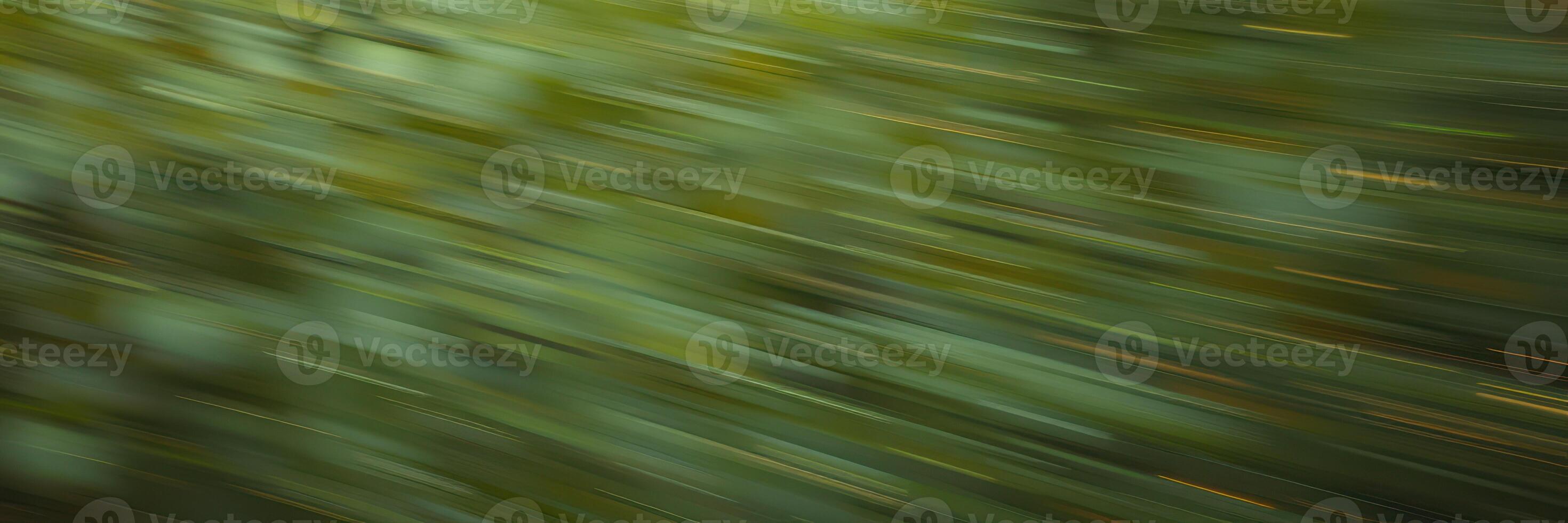 Motion blur of green foliage during a sunny day in a forest, capturing vibrant colors and dynamic movement photo