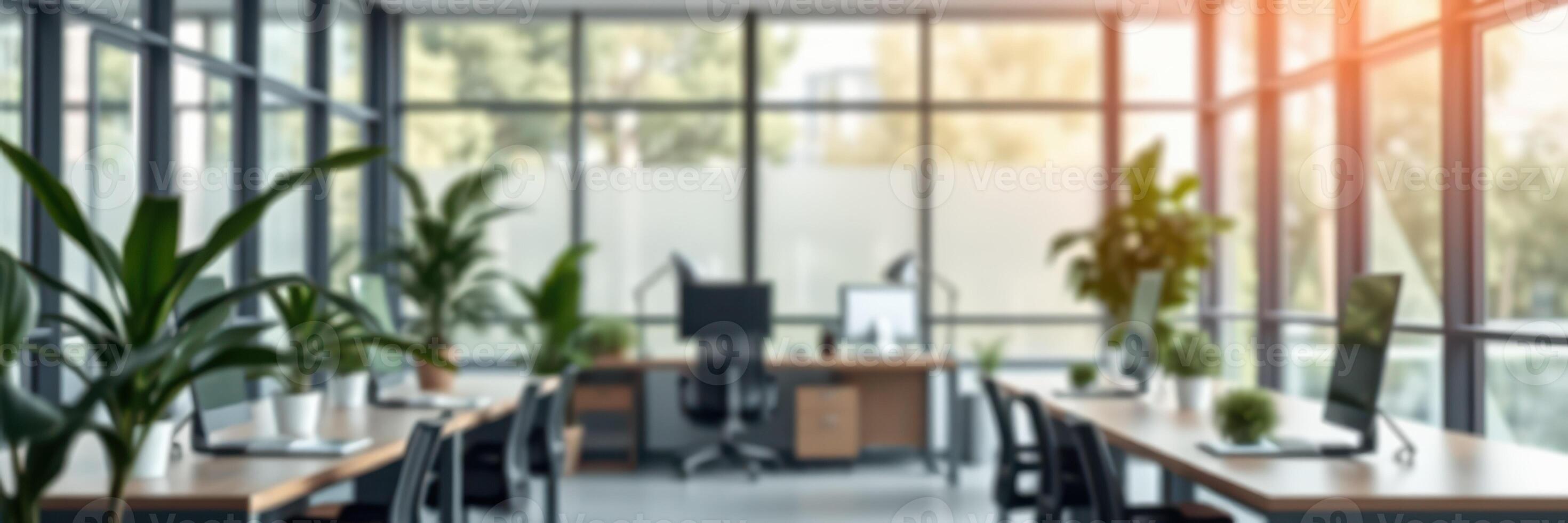 Modern office interior with large windows and greenery creating a bright and inviting workspace environment photo