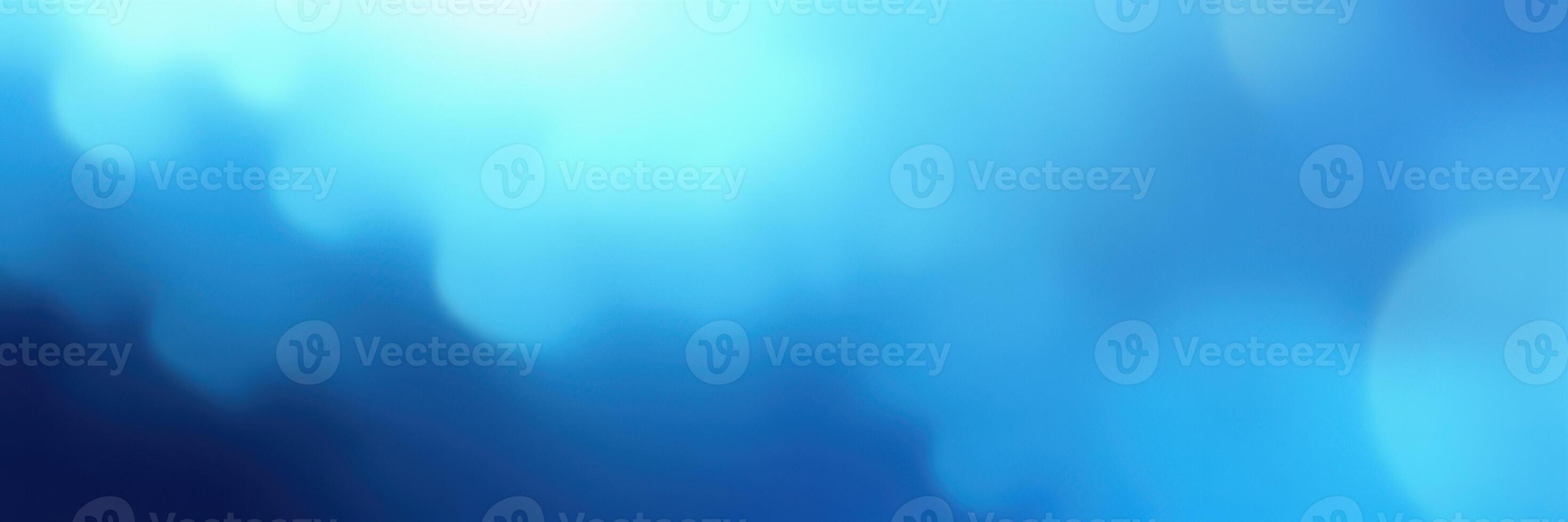 Soft blue abstract background with gentle gradients creating a serene atmosphere for design and art photo