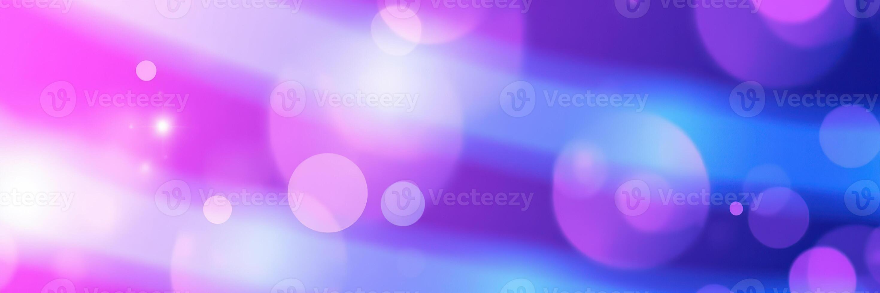 Colorful bokeh background with vibrant purple and blue hues creating an abstract visual effect for artistic projects photo