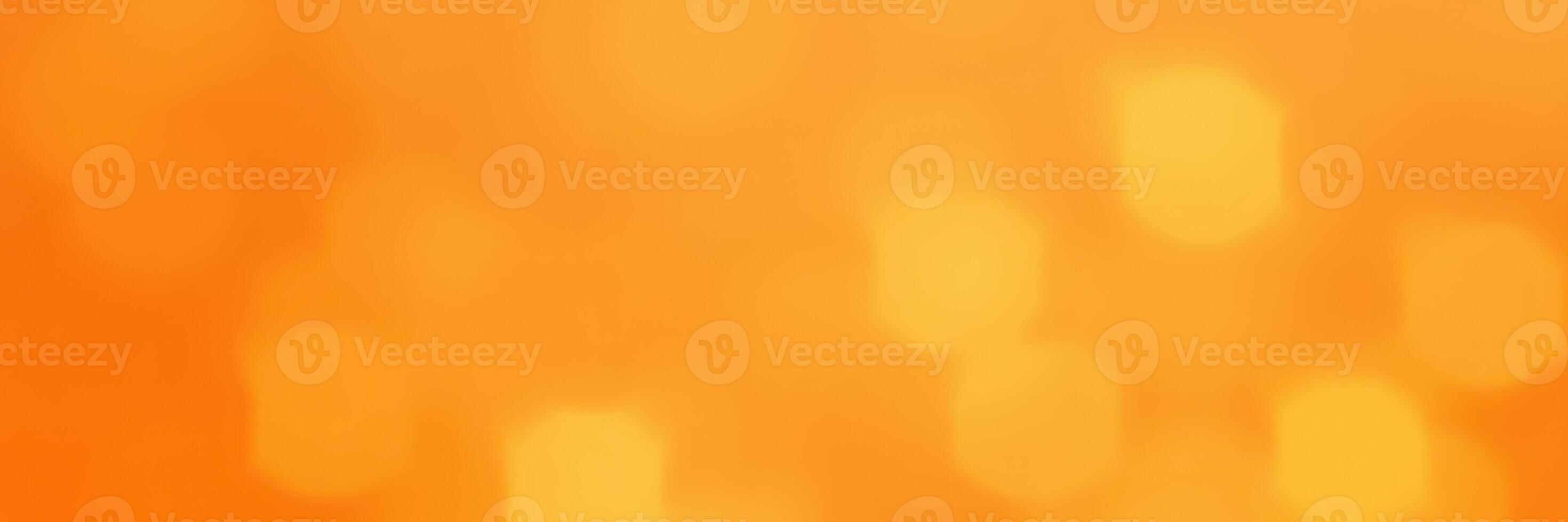 Vibrant orange background with glowing bokeh lights creating a warm and inviting atmosphere during an evening event photo