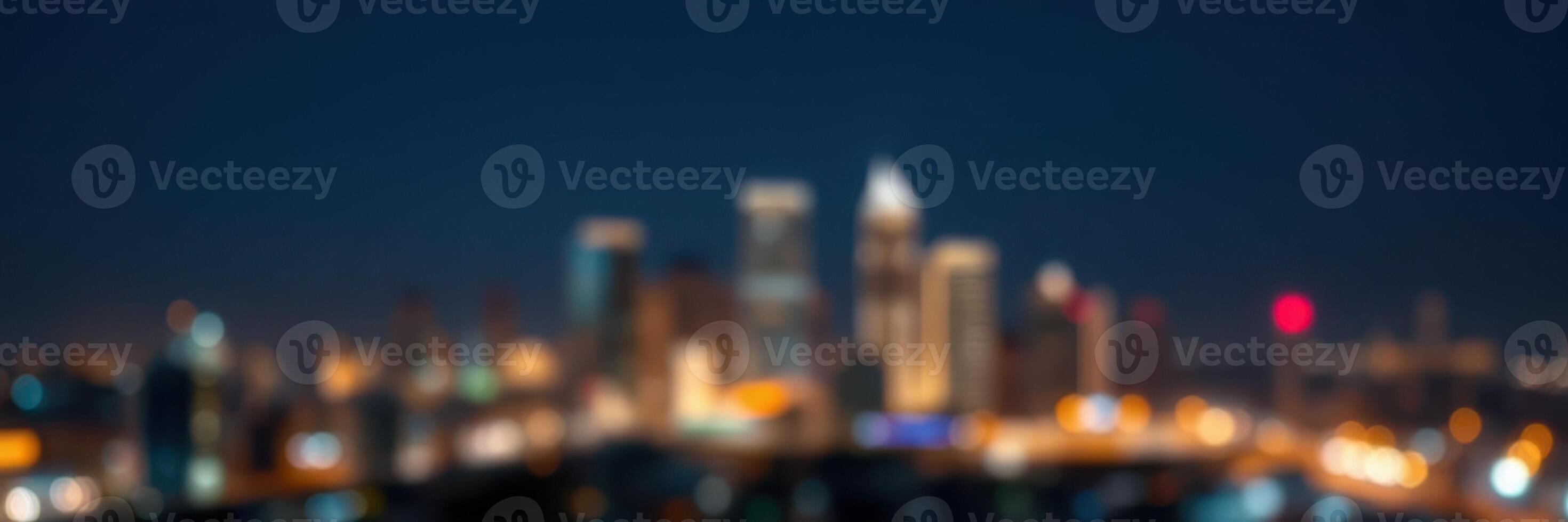 Vibrant city skyline illuminated at night showcasing urban life and architecture with glowing lights photo