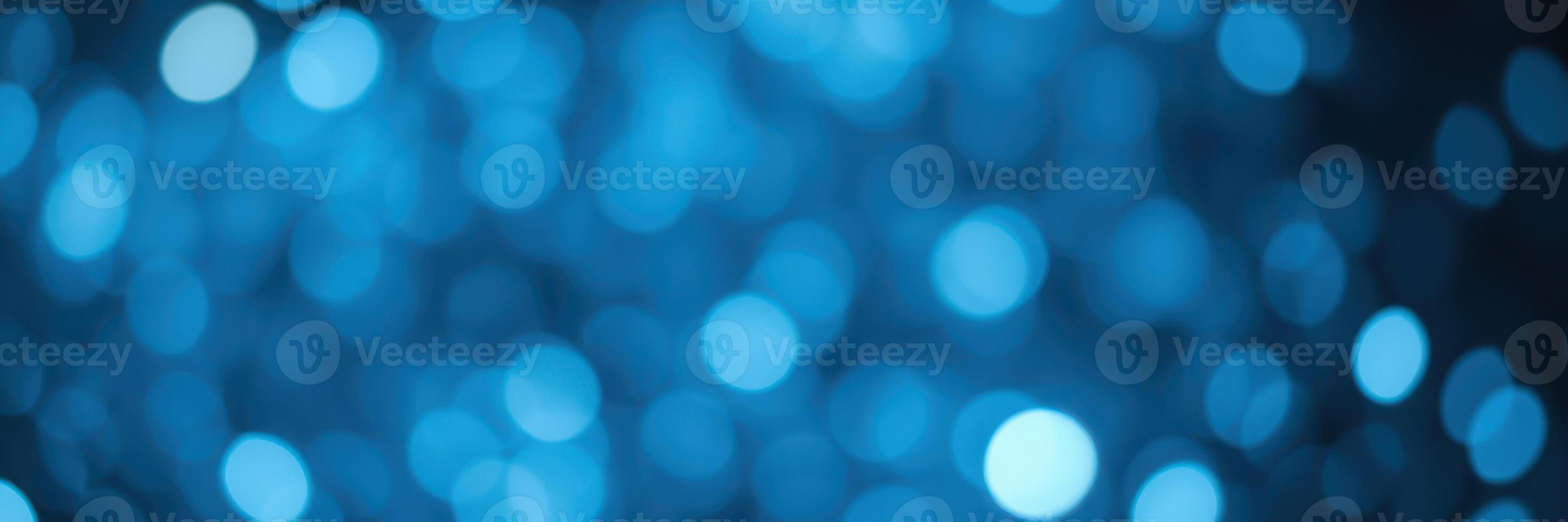 Vibrant blue bokeh lights create a serene atmosphere in an evening setting ideal for celebrations and relaxation photo